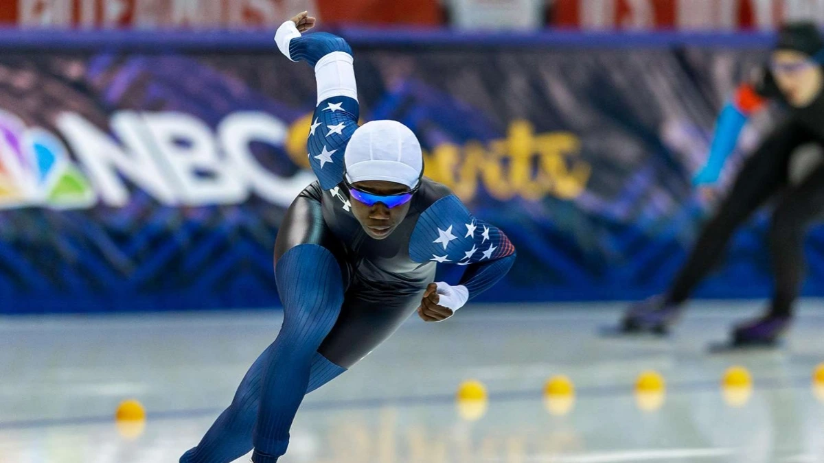 Erin Jackson and Brittany Bowe compete in the women’s 1,000 meters speed skating race at the Milan Cortina Winter Olympics.