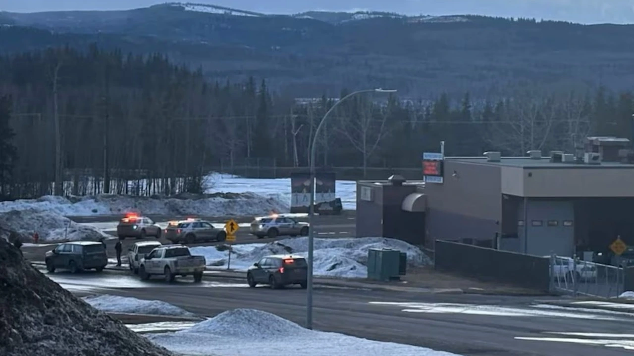 Students exit a school in British Columbia after a deadly shooting that left eight people dead, with police securing the area.