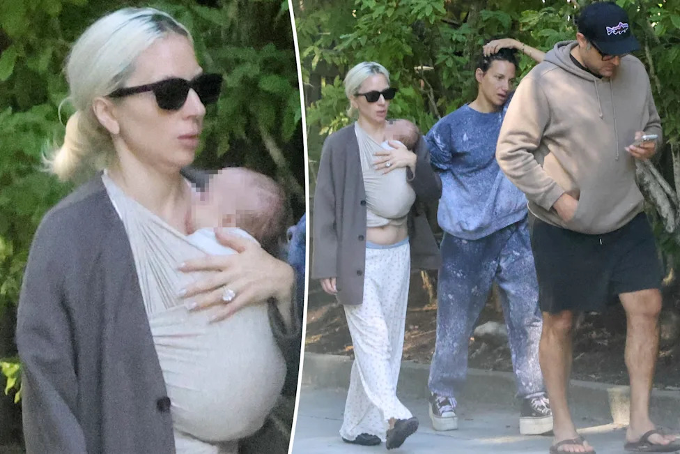 Lady Gaga carrying her newborn baby while walking with fiancé Michael Polansky in Northern California