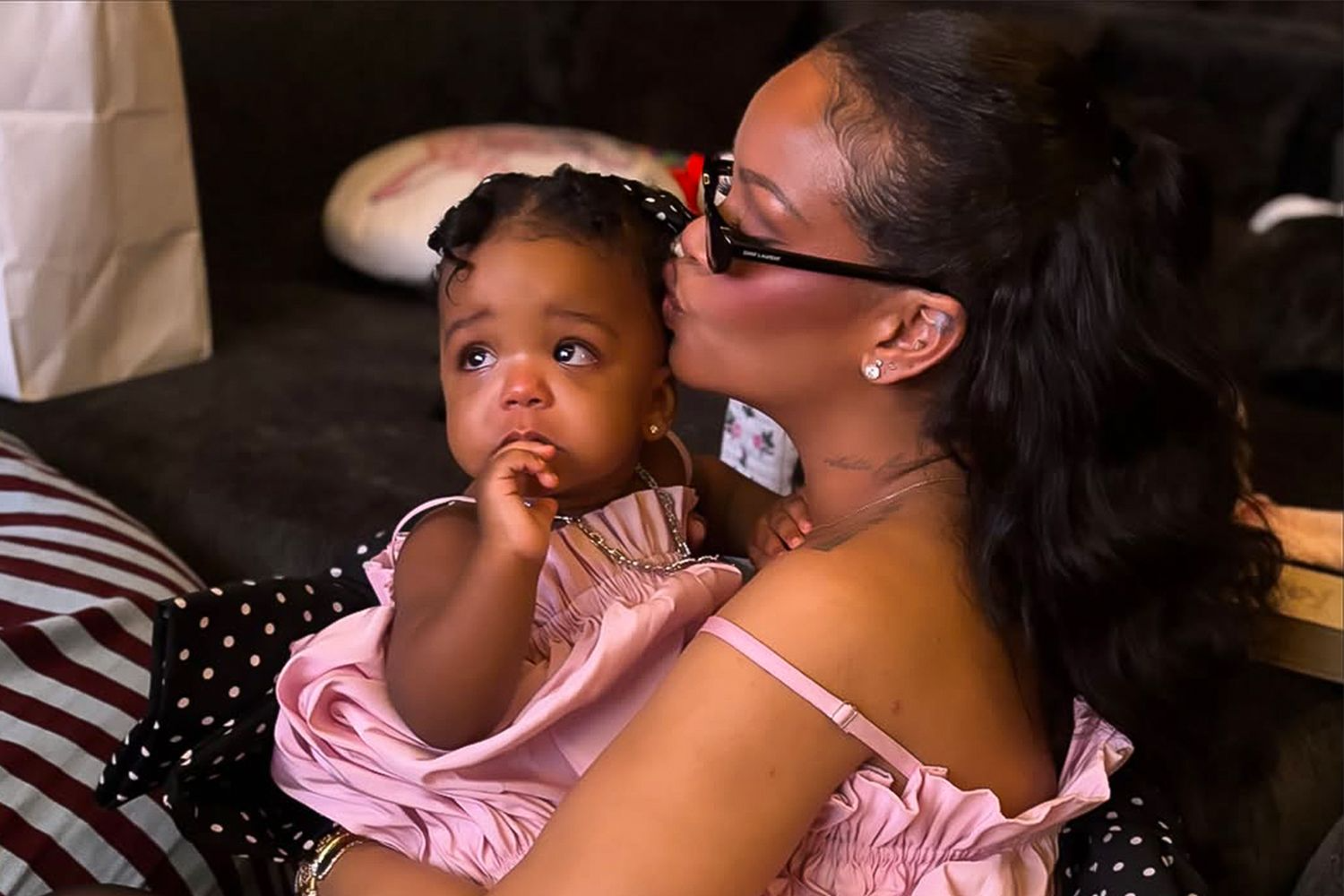 Rihanna’s daughter Rocki celebrates her 1st birthday in a pink ruffled outfit matching her mother
