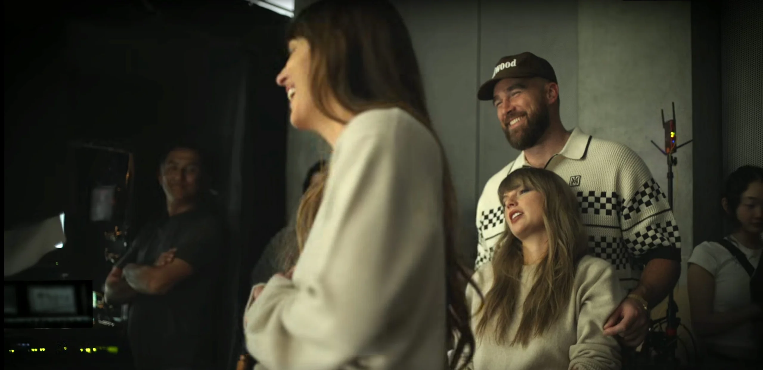 Taylor Swift and Travis Kelce share a rare moment behind the scenes during the filming of the Patient Zero music video.
