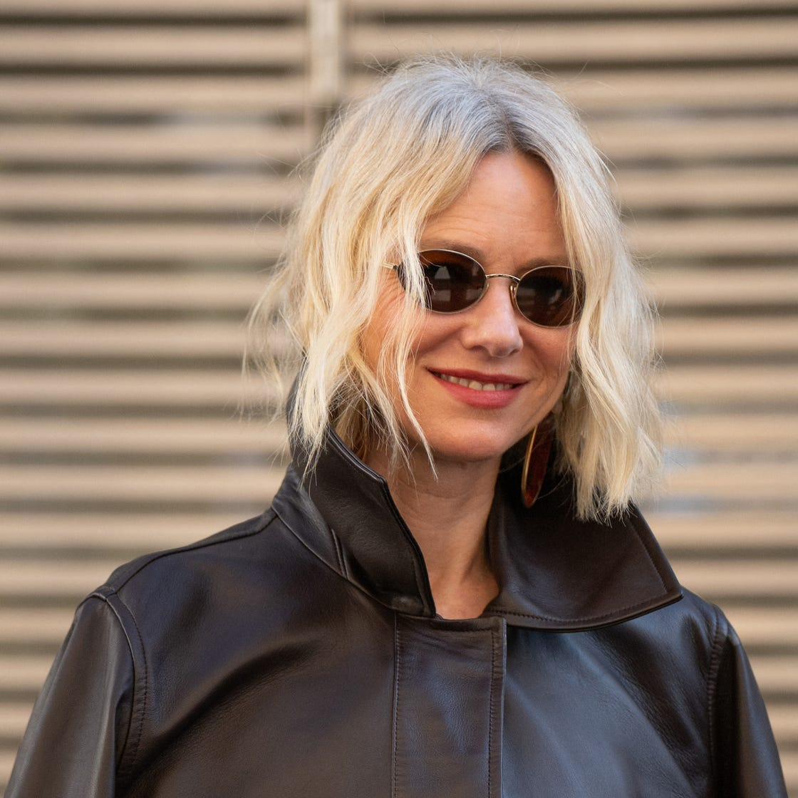 Waterfall bob haircut featuring soft cascading layers and glossy waves, an elegant autumn 2026 hairstyle trend.