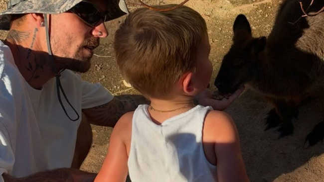 Justin Bieber with son Jack during a family wildlife outing with kangaroos and a giraffe